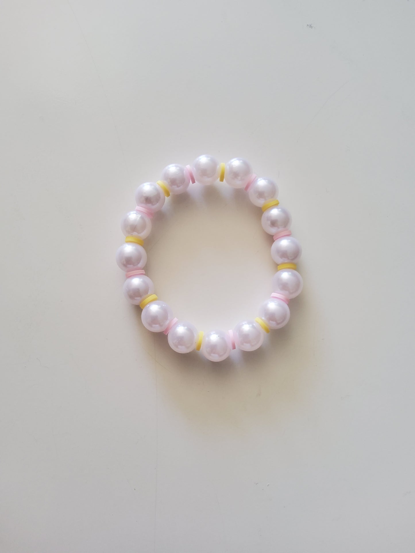 Pink yellow pearl bracelet
